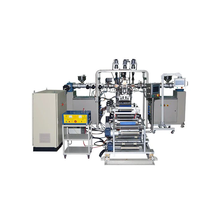 Laboratórny trojvrstvový odlievací filmový stroj